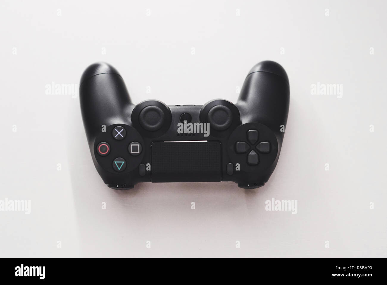 Joystick from the game console on a white table Stock Photo