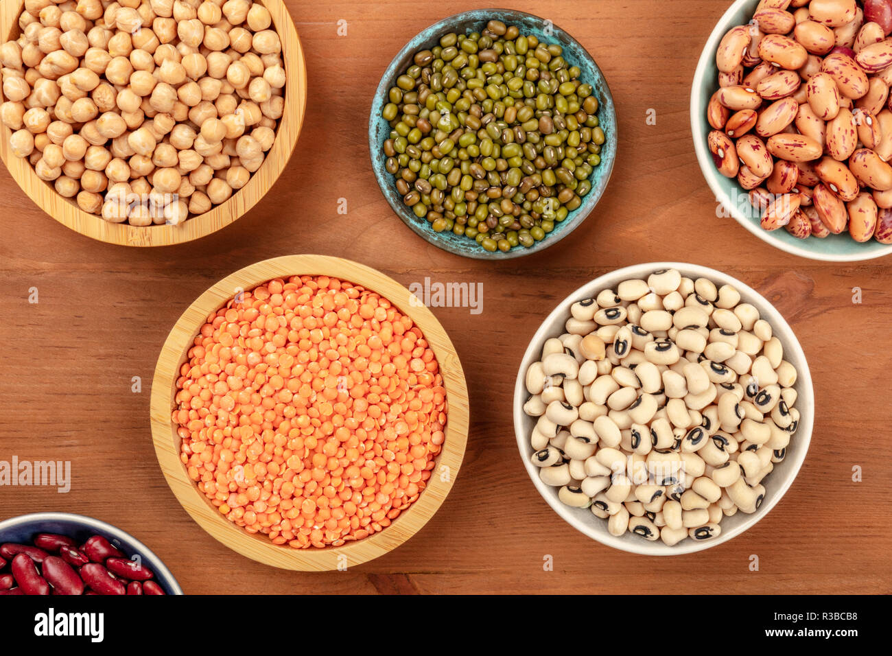 A Photo Of Various Types Of Legumes Shot From The Top On A Dark Rustic Wooden Background Different Beans Lentils Chickpeas Soybeans Stock Photo Alamy