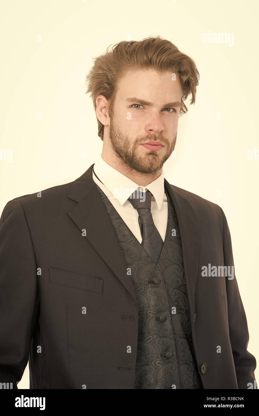 Manager with beard on serious face. Businessman or ceo in black jacket