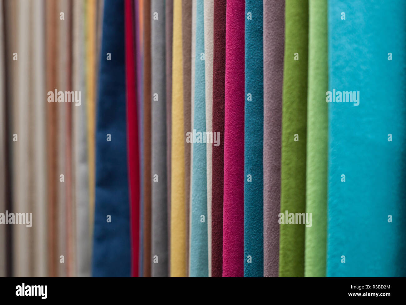 Fabric of different colors folded to each other Stock Photo - Alamy