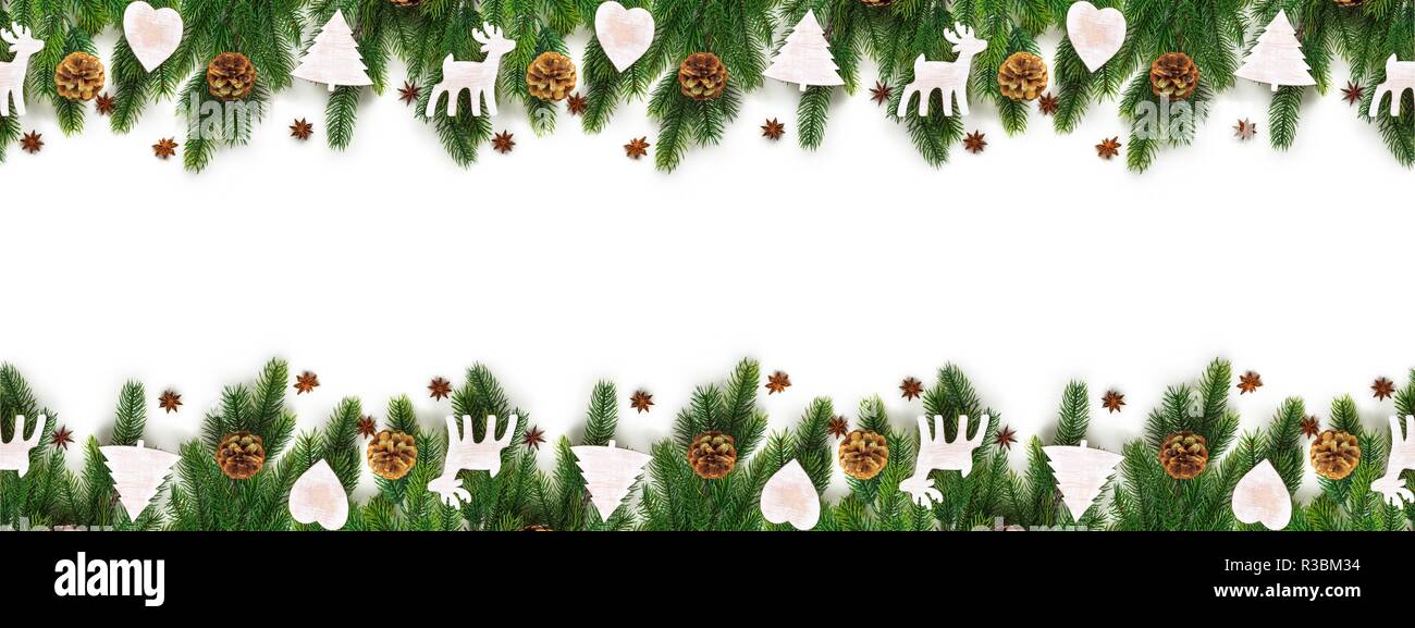 Christmas tree branches on white background as a border or template Stock Photo