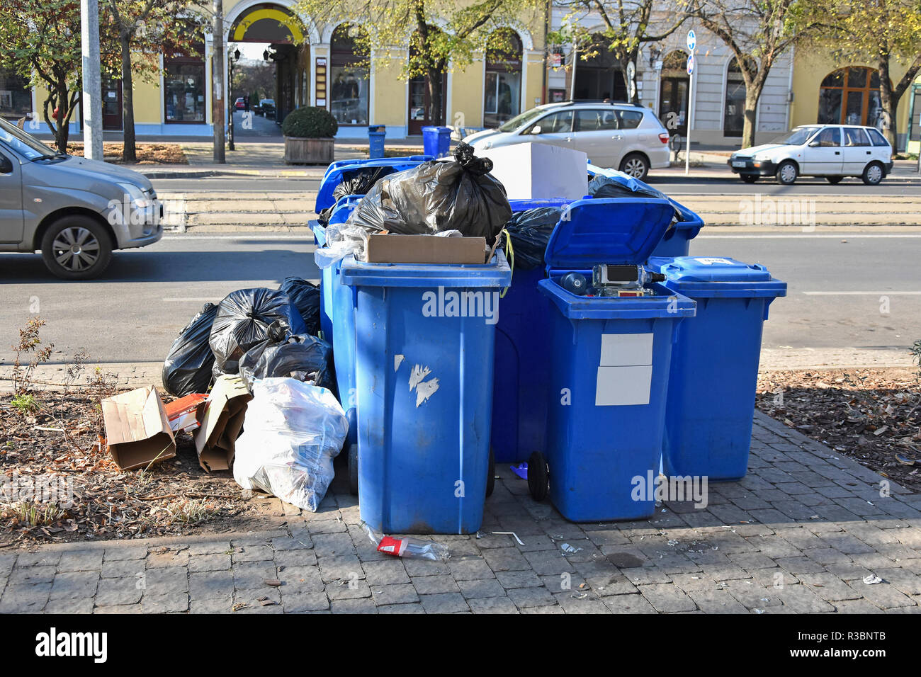 Garbage cans on the city street Stock Photo Alamy