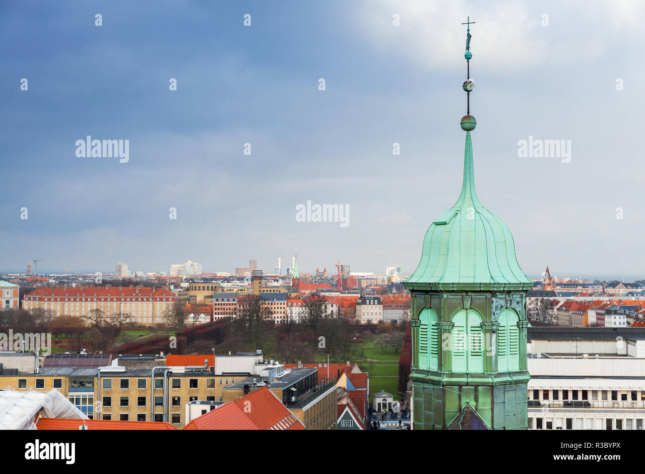 Cityscape of Copenhagen with spire of Trinitatis Church. Photo taken from The Round Tower, popular old city landmark and viewpoint. Denmark Stock Photo