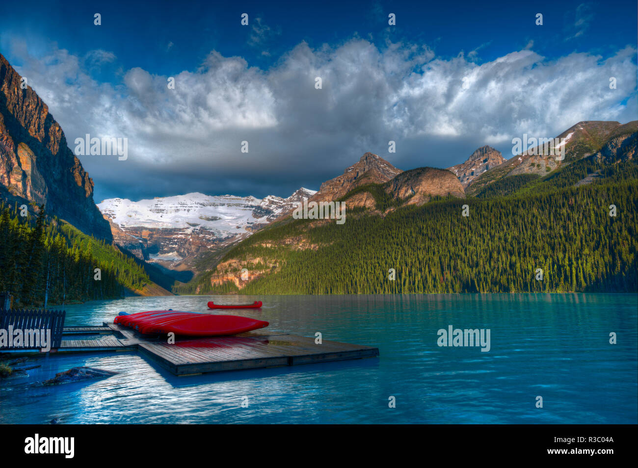 Banff Dock Canada, Alberta, Banff National Park. Canoes on Lake Louise dock at ...