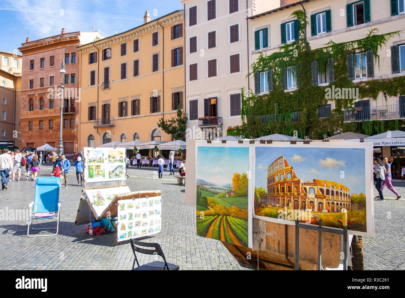 Street artists selling their paintings in Piazza Navona in the centre
