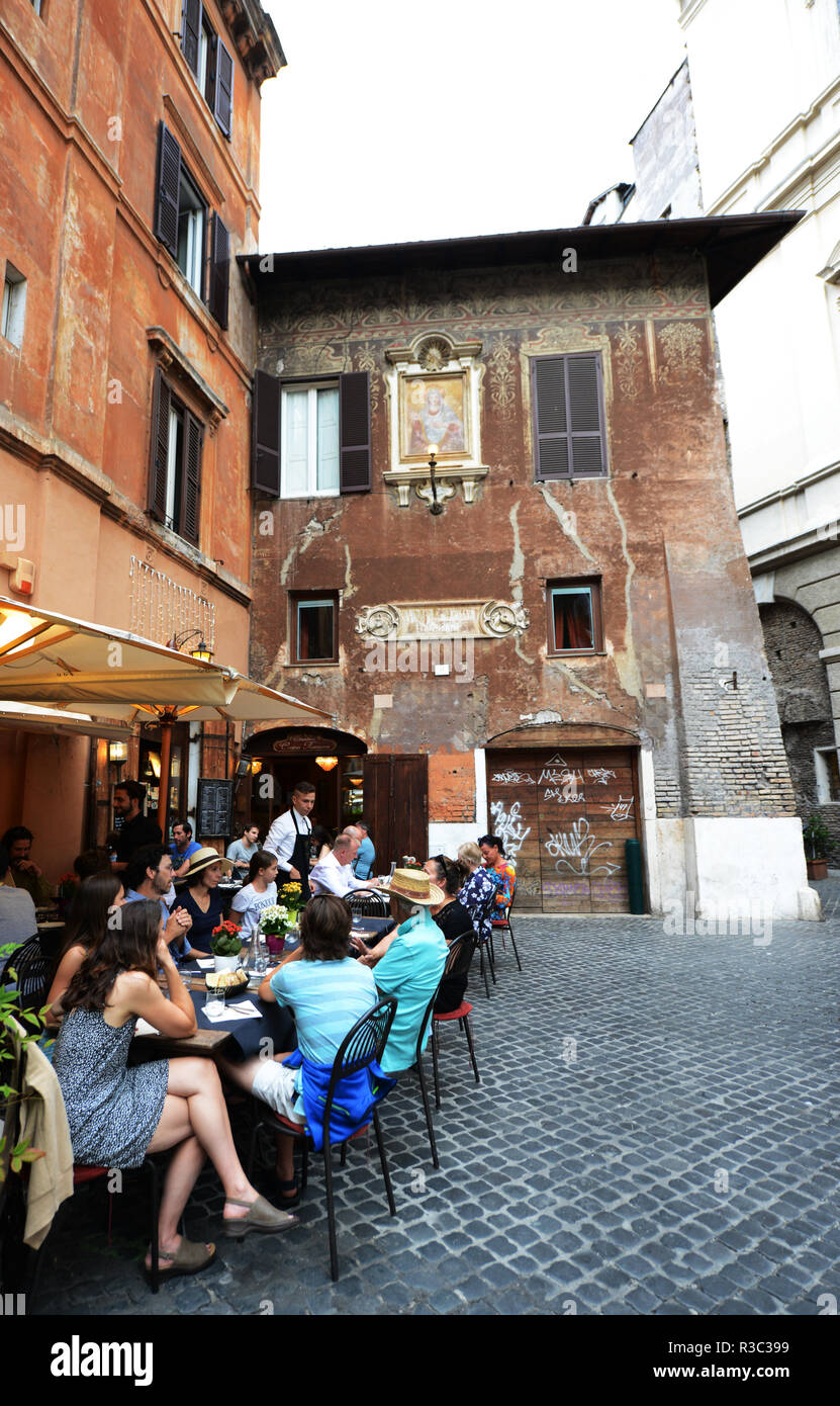 A busy restaurant on Piazza del Biscione in Rome. Stock Photo