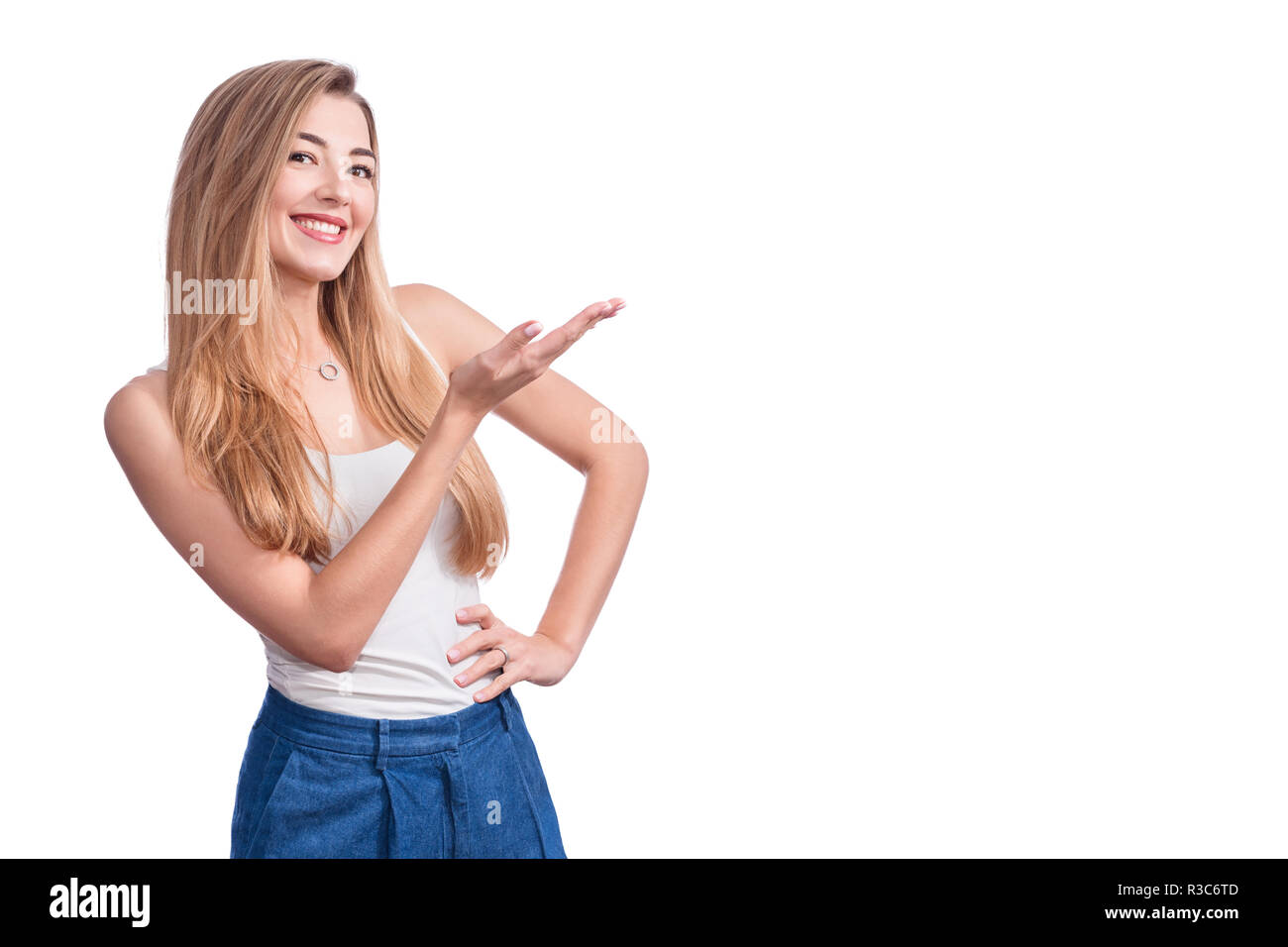 Happy Young Woman Standing Isolated Over White Wall Background Looking Camera Showing Copyspace 3043