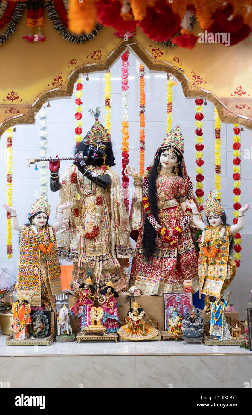 Ornate statue of the Hindu from left, Gaur, Krishna, Radha & Nital . At the Om Shakti Hindu temple in Flushing, Queens, New York. Stock Photo