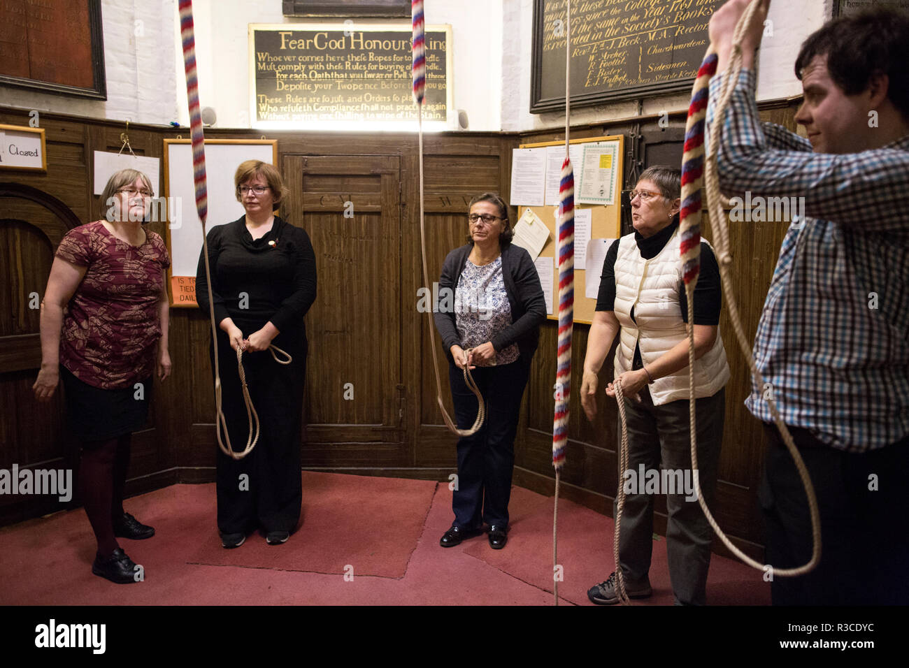 Church bellringers ahead of Remembrance Day practice their bell