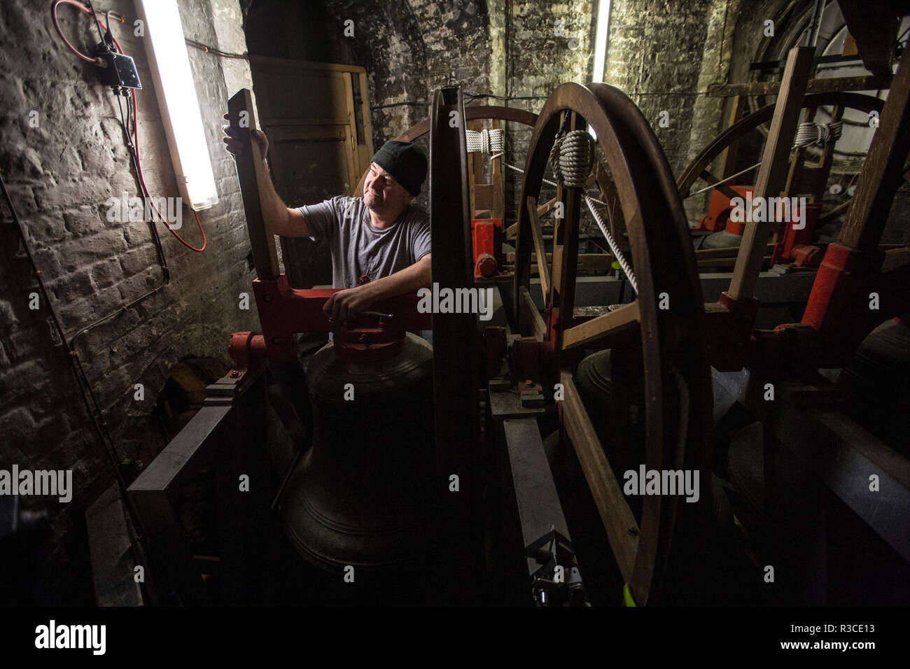 Church bellringers ahead of Remembrance Day practice their bell