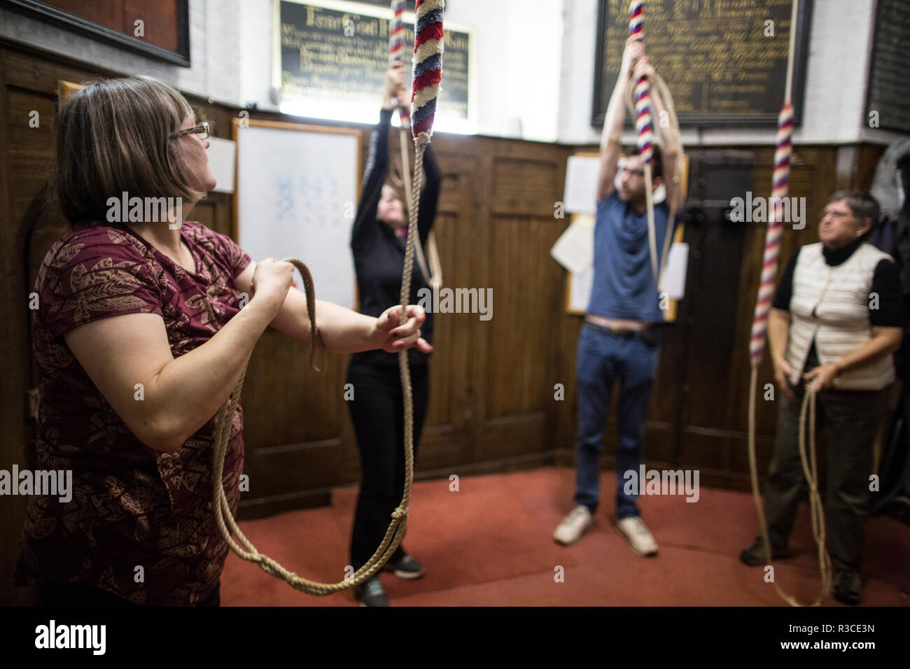 Church bellringers ahead of Remembrance Day practice their bell