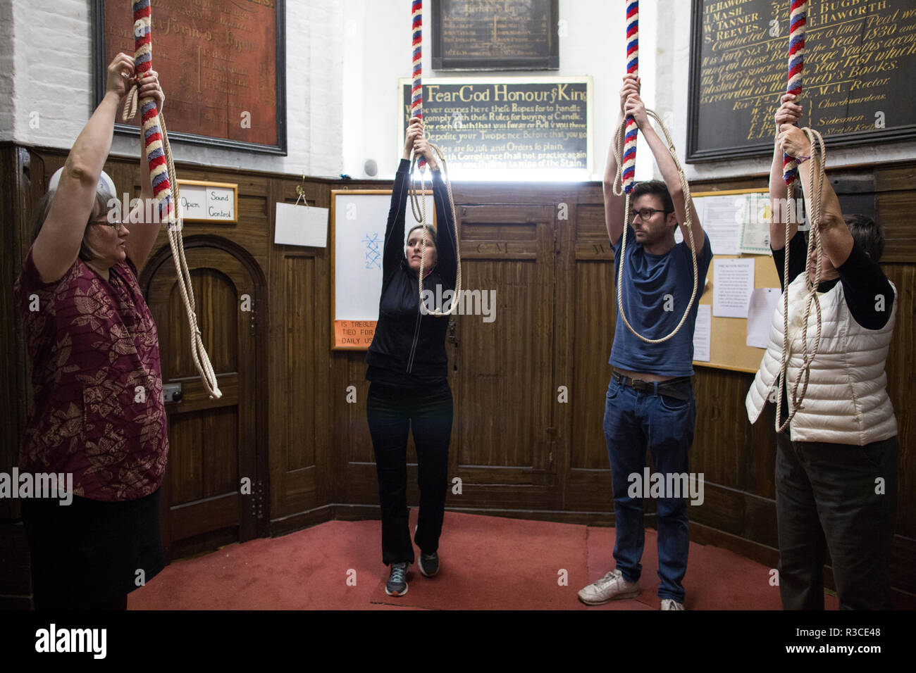 Church bellringers ahead of Remembrance Day practice their bell