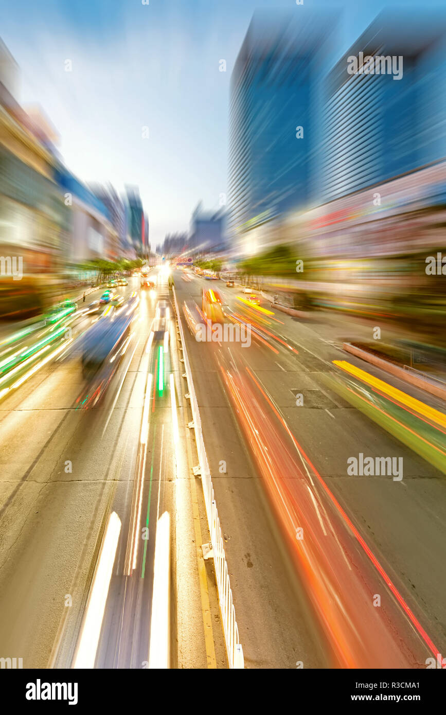 the light trails on the modern building background in shanghai china Stock Photo