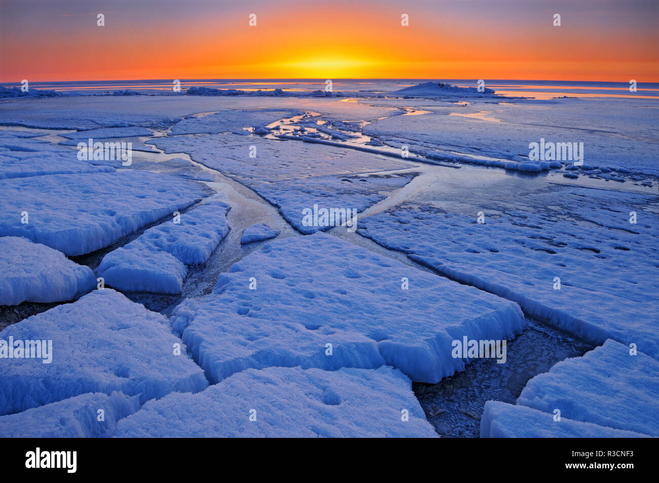 Canada, Manitoba, Winnipeg. Sunrise on Lake Winnipeg spring ice Stock