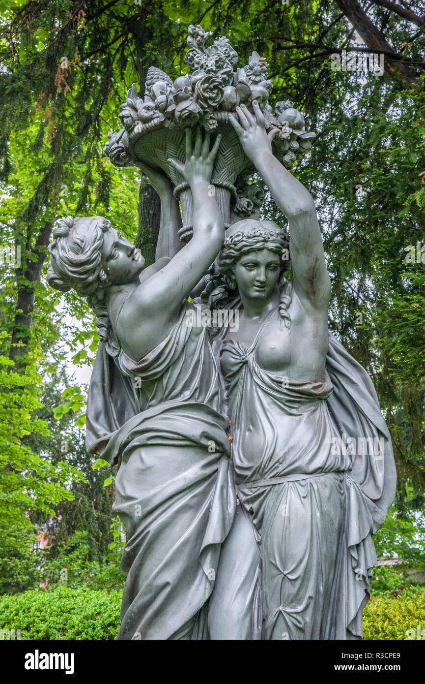Cast iron allegories in City Hall Garden, Epernay, Champagne, France Stock Photo