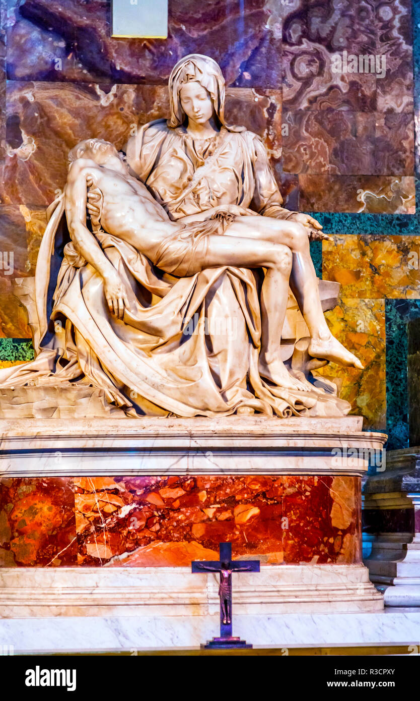 Michelangelo Pieta Mary and Jesus Sculpture Cross, Saint Peter's Basilica, Vatican, Rome, Italy. Stock Photo