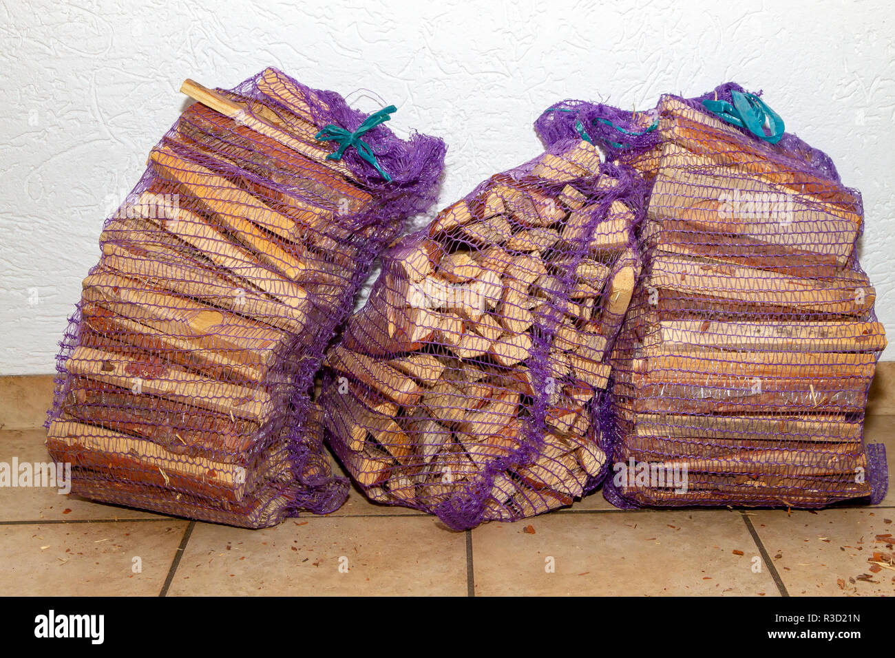 Sacks with firewood Stock Photo