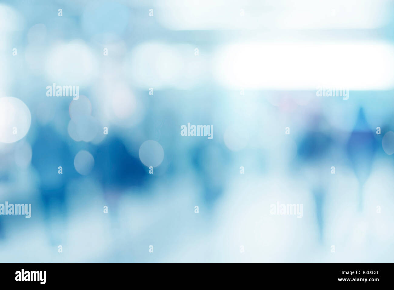 abstract defocused blurred empty space technology background with silhouettes of unrecognizable people Stock Photo