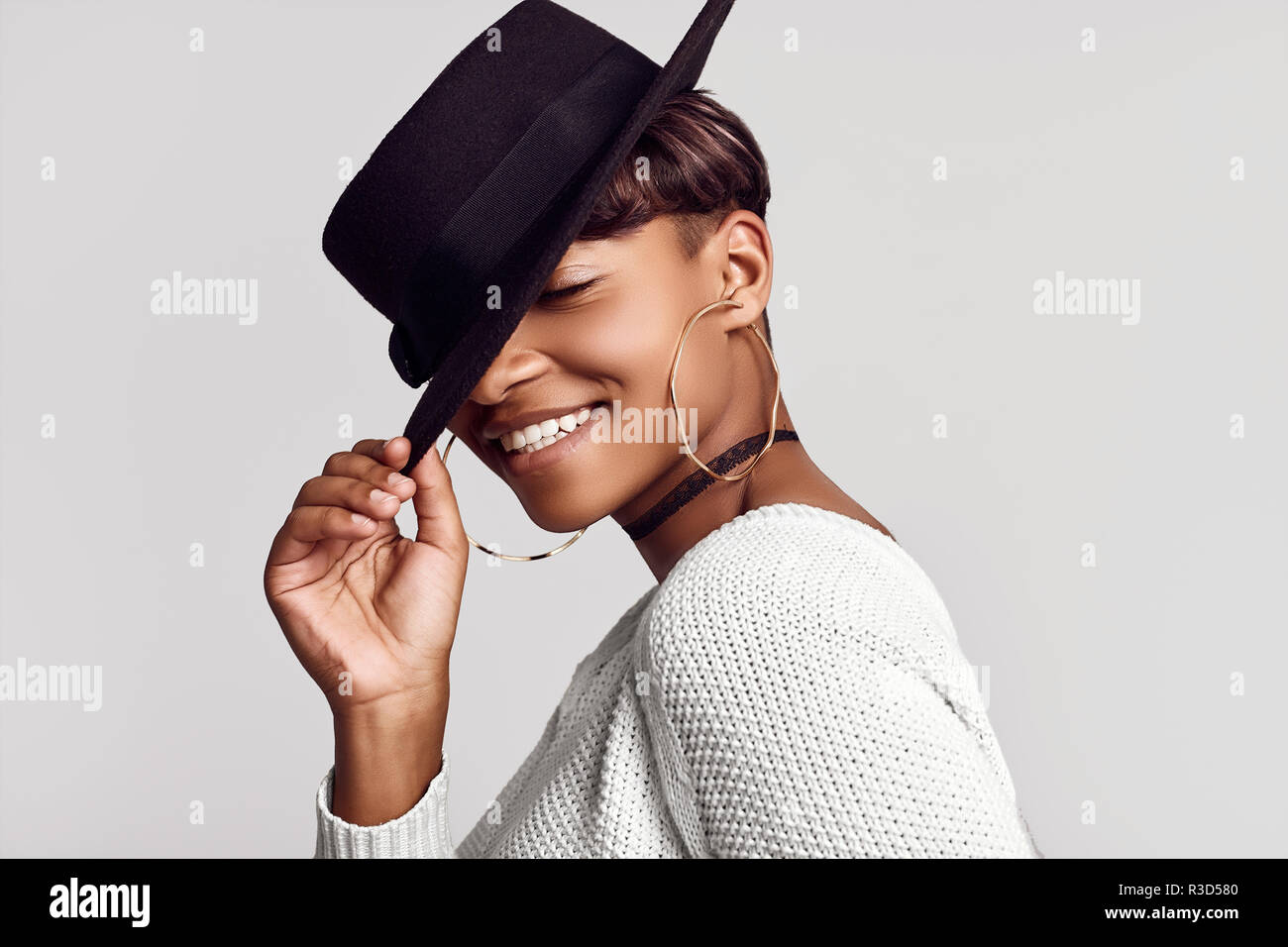 Portrait Of Young Beautiful Hipster Black Girl With Short Hair