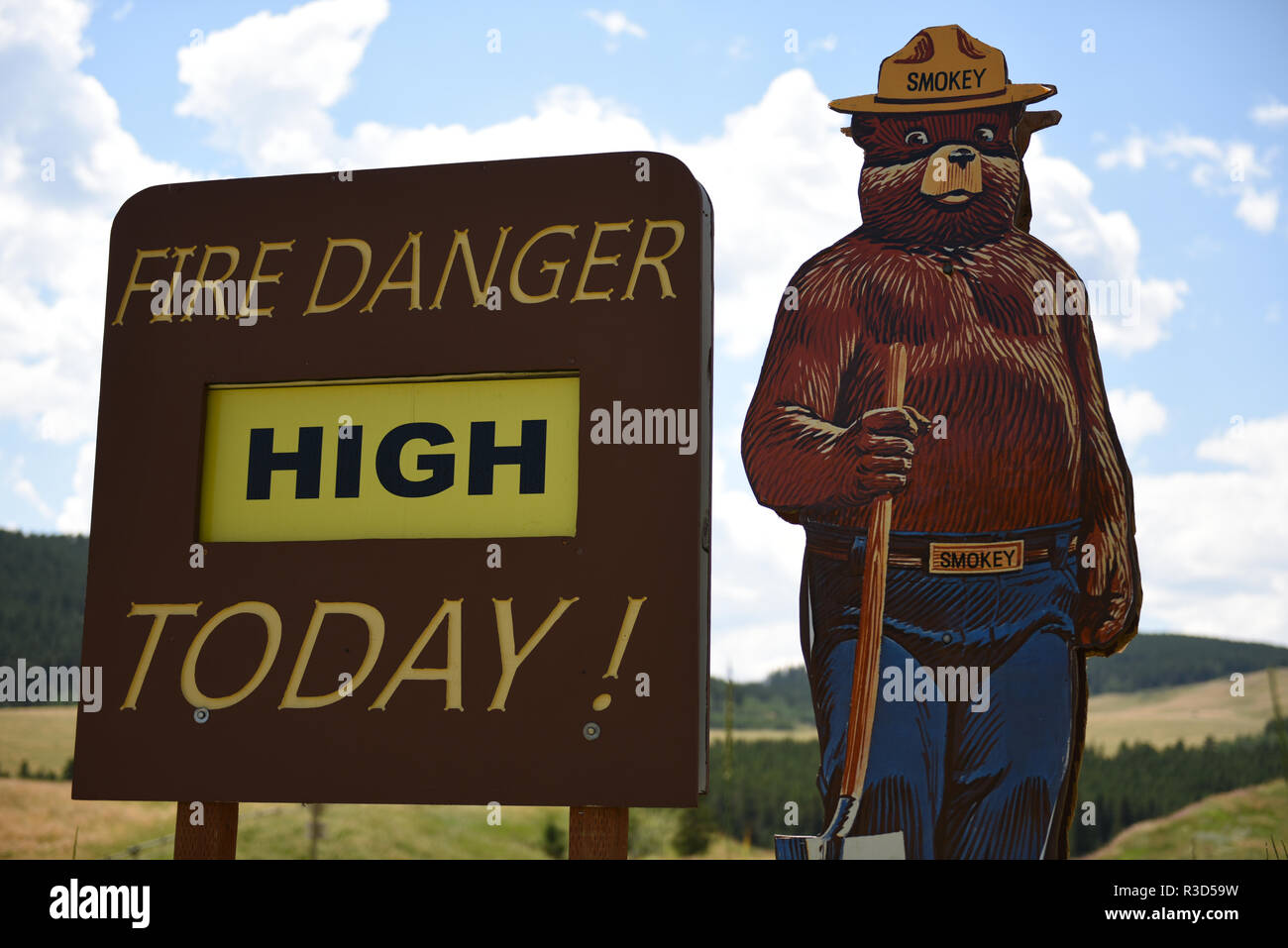 Smokey the Bear road-side warning sign that the forest fire danger is