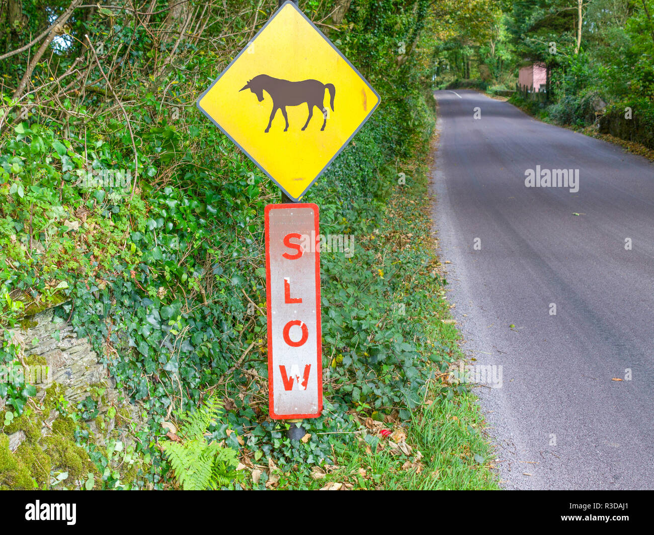 roadside sign warning of unicorn or unicorns crossing. Stock Photo