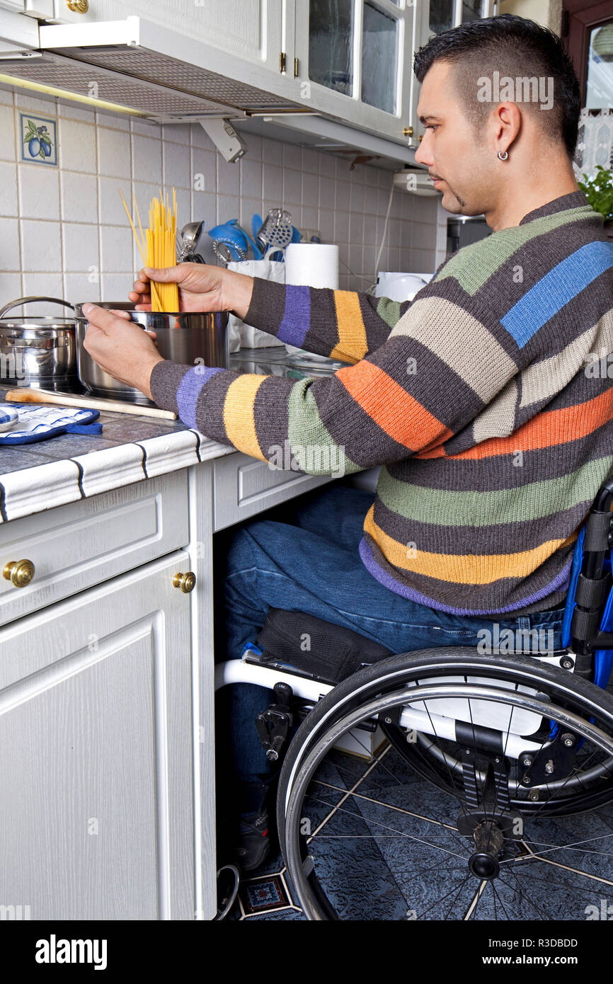 wheelchair cooking Stock Photo
