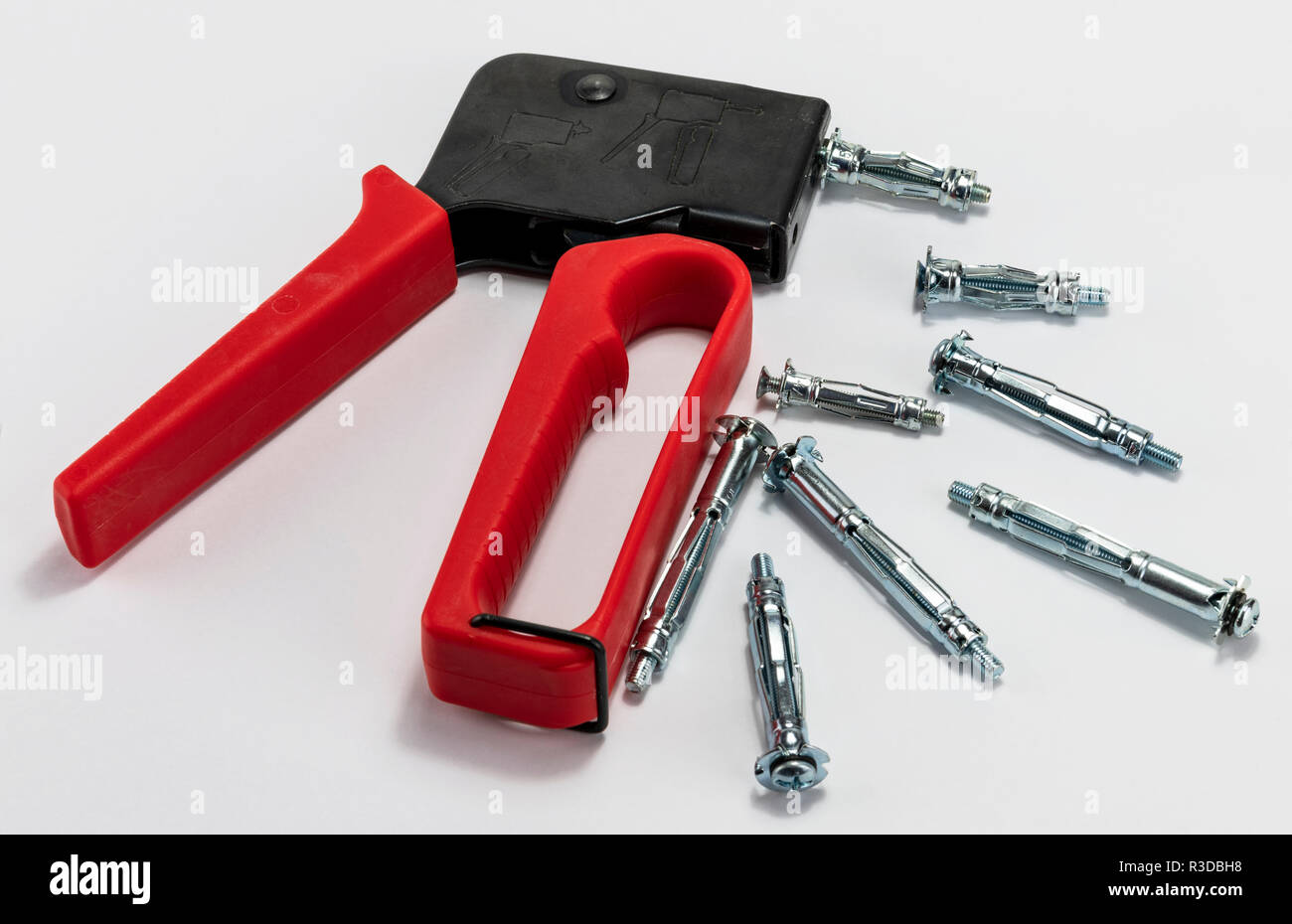 Metal Cavity Wall Fittings and Anchor fixing gun Stock Photo Alamy
