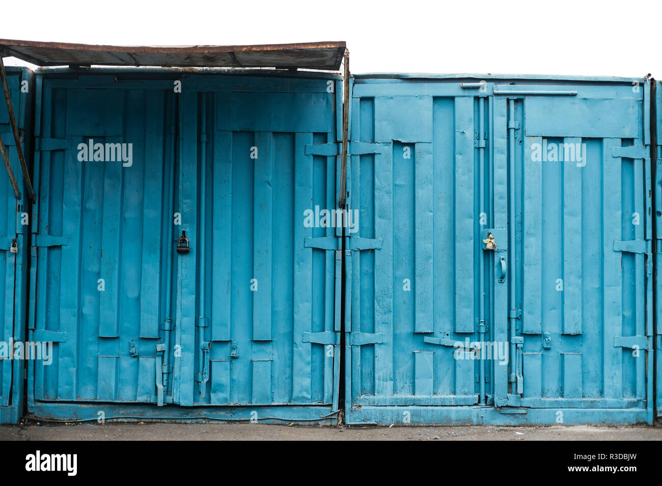 Blue cargo ship containers close up on local market Stock Photo