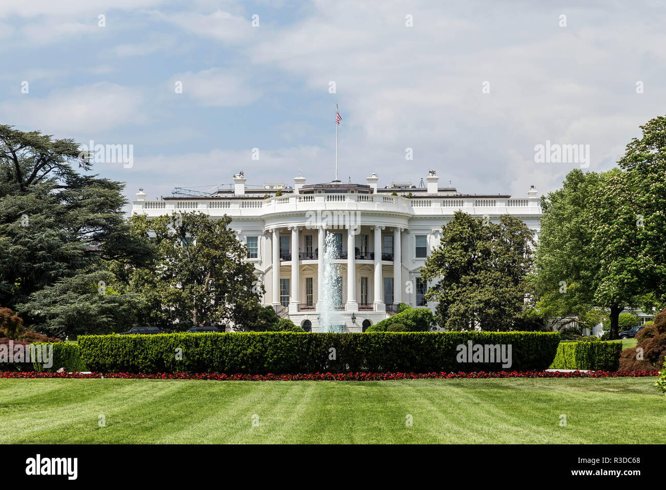 The White House in Washington DC from the South Lawn on a beautiful day. Stock Photo