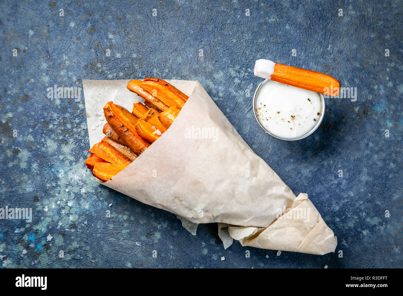 Healthy fries alternative carrot fries chips wood background copy