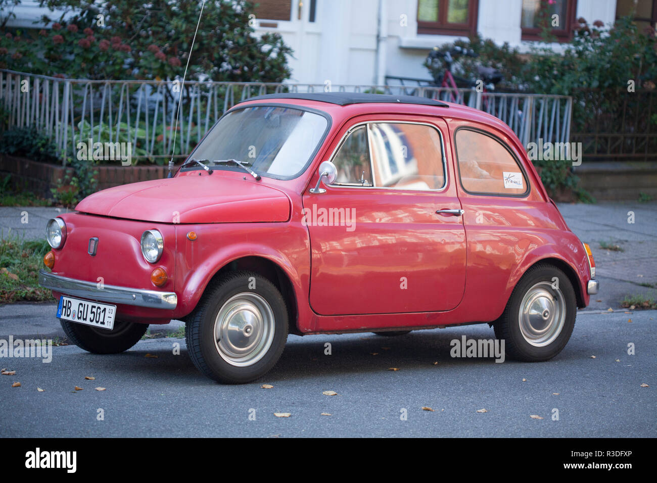 Old red Fiat 500 or Cinquecento, Germany, Europe  I Alter roter Fiat 500 oder Cinquecento,  Deutschland, Europa I Stock Photo