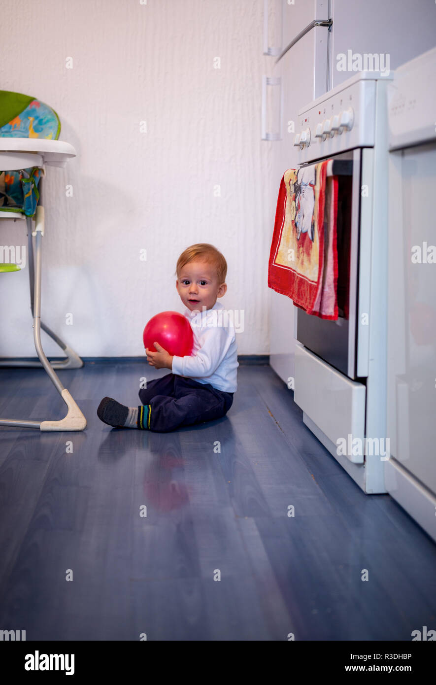 Baby boy learns to crawl hi-res stock photography and images - Alamy