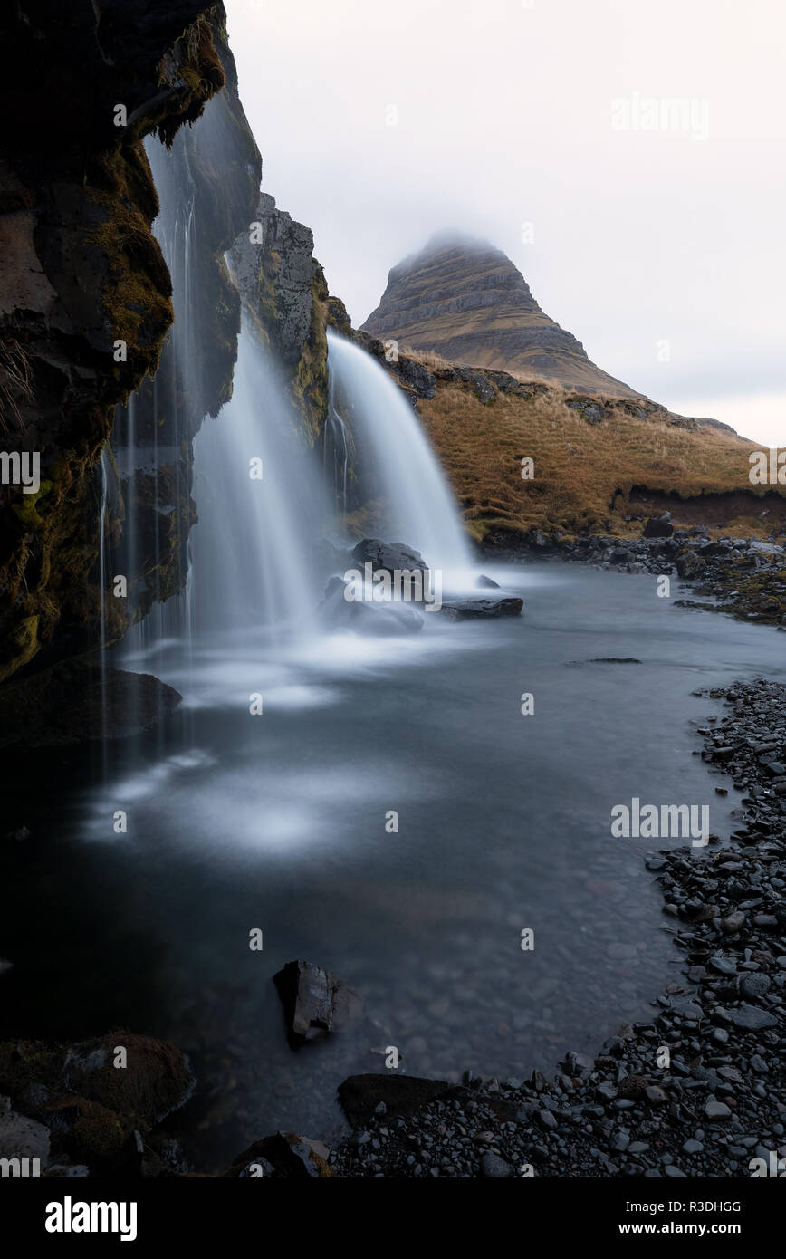 Kirkjufellfoss waterfalls at Snaefellness peninsula in Iceland Stock Photo