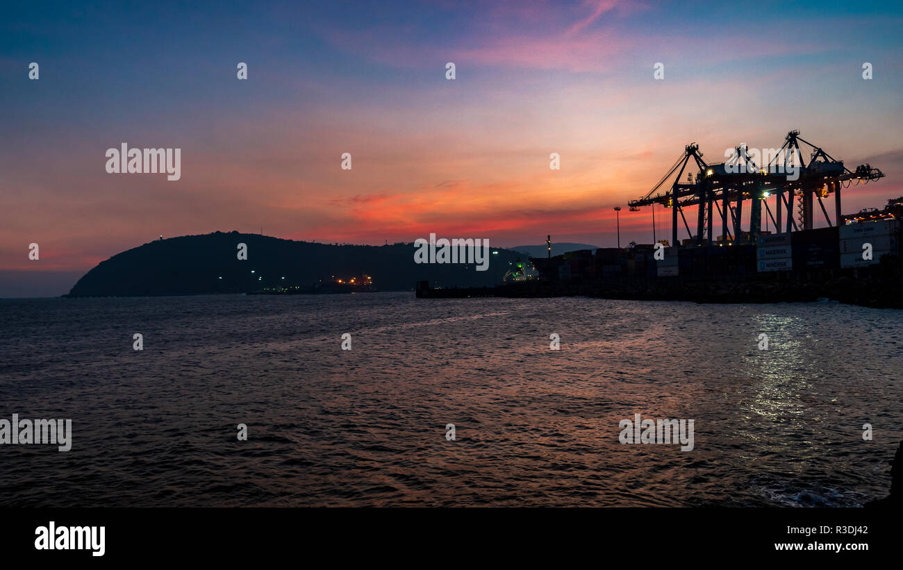 November 13,2018. Visakhapatnam,India. Silhouette of Dolphin's nose and Gangavaram port at the time of Sunset. Stock Photo