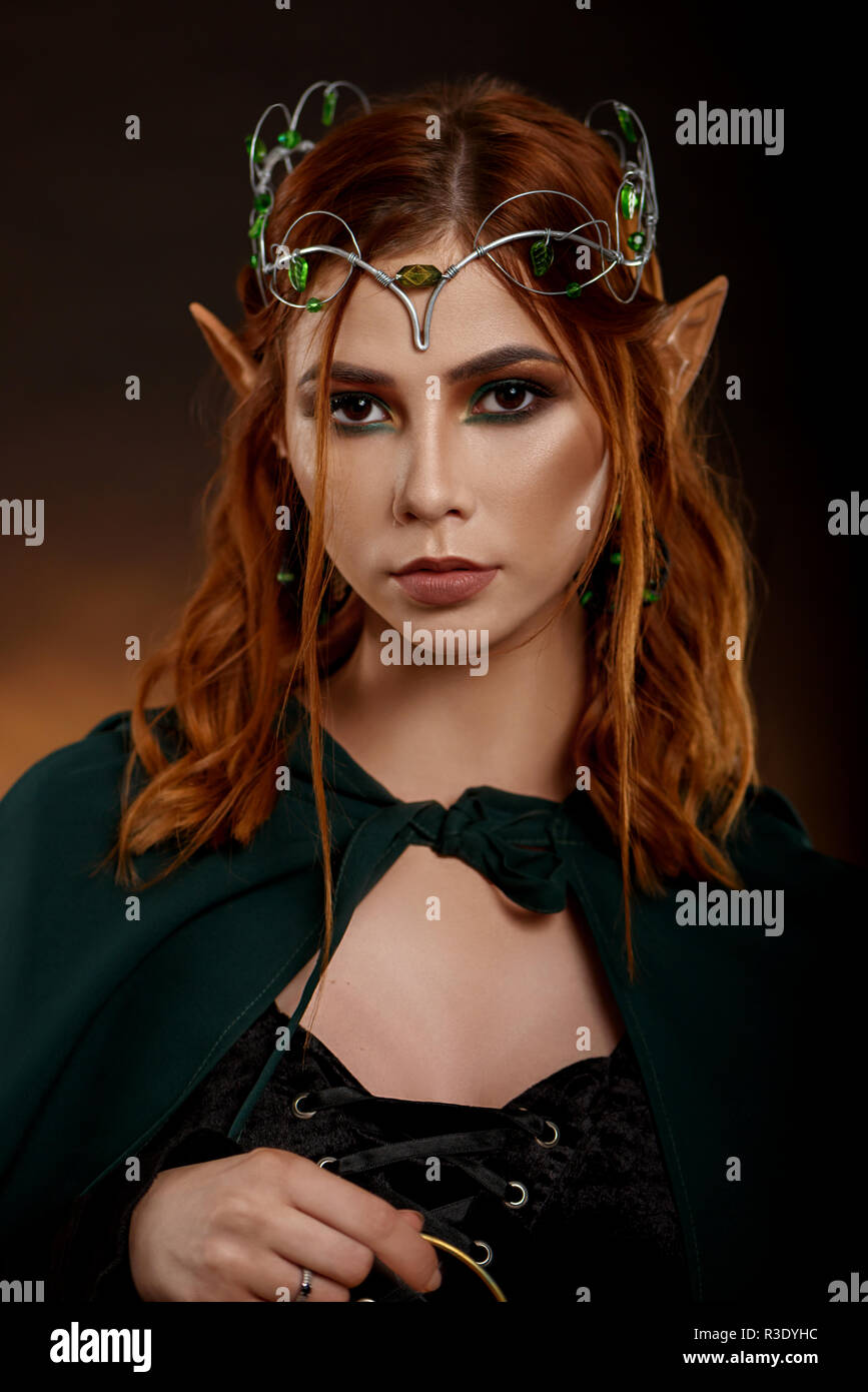 Portrait Of Beautiful Charming Girl With Silver Tiara On Her