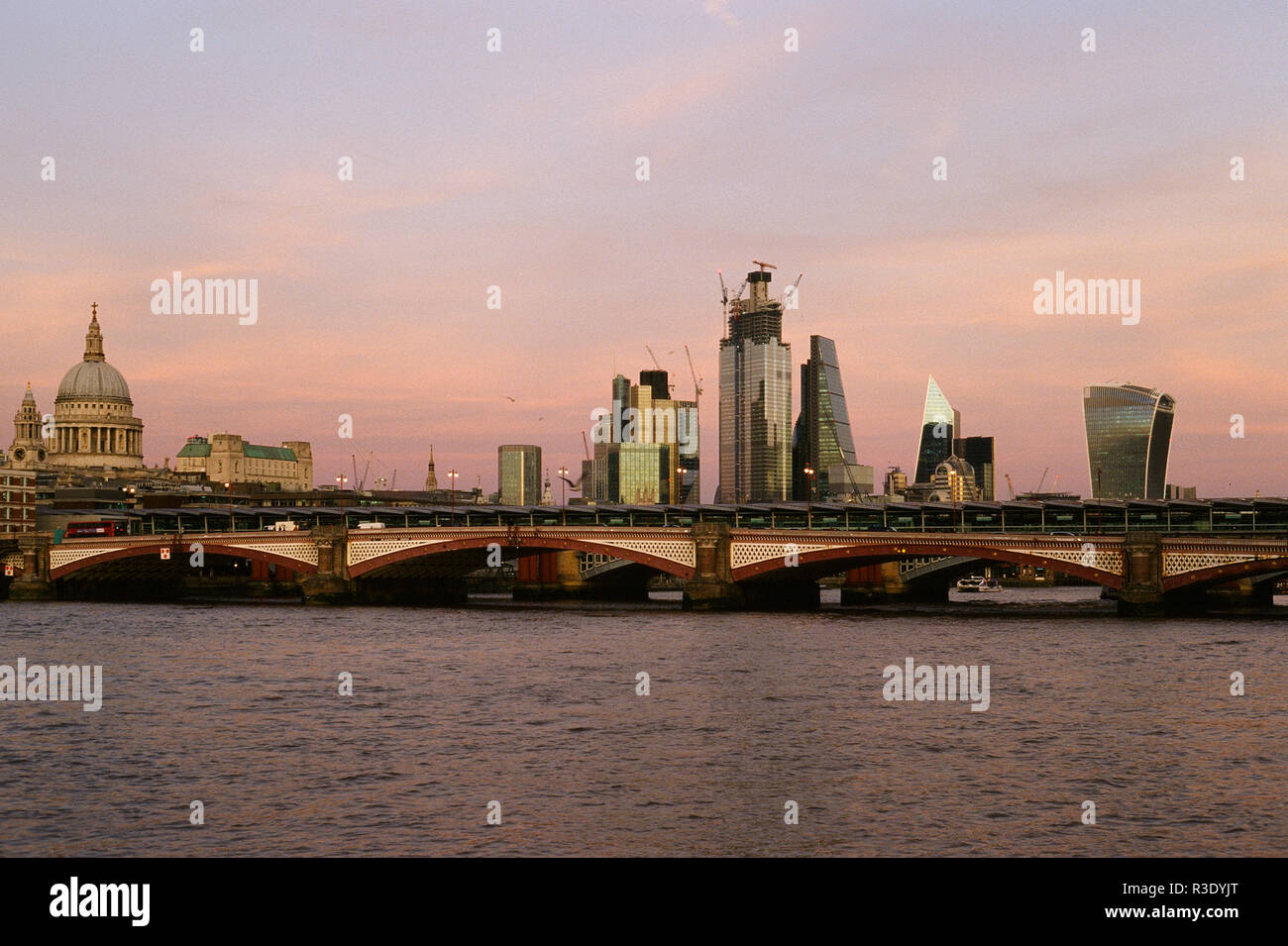 City of London skyline at dusk, with St Paul's Cathedral, and Blackfriars Bridge Stock Photo