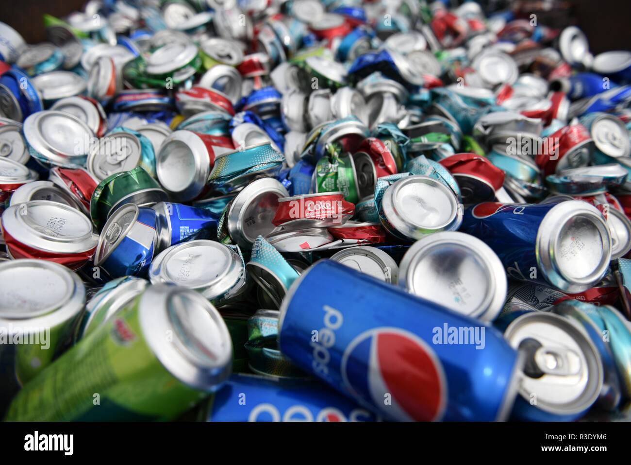 Aluminum Can Recycling, large pile of smashed, crushed, discarded empty soft drink or soda aluminum beverage cans Stock Photo