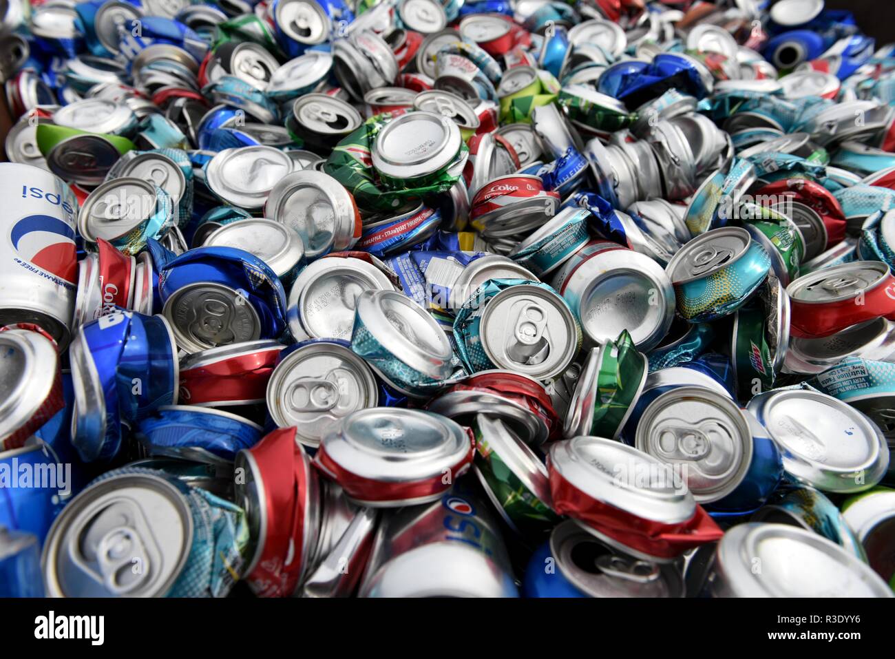 Gillette, Wyoming / July 25 2017: Aluminum Can Recycling, large pile of smashed, crushed, empty, beer and soda beverage cans for scrap metal recycling Stock Photo