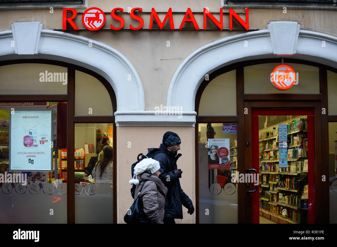 People seen walking by a Rossmann shop ahead of the Black Friday Stock  Photo - Alamy