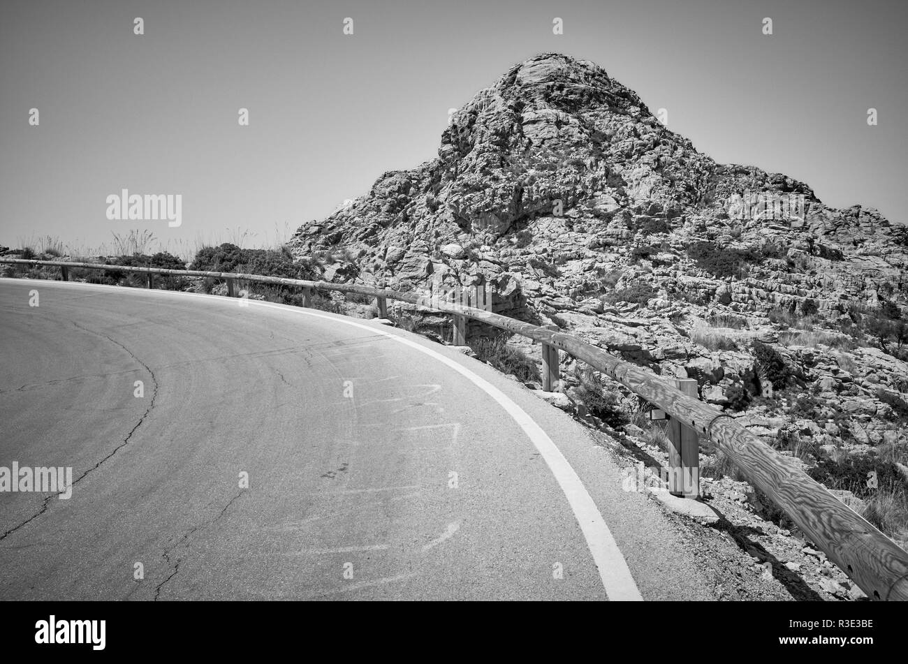 Black and white picture of a mountain road curve, Mallorca, Spain. Stock Photo