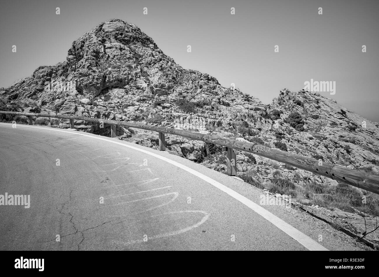 Black and white picture of a mountain road curve, Mallorca, Spain. Stock Photo