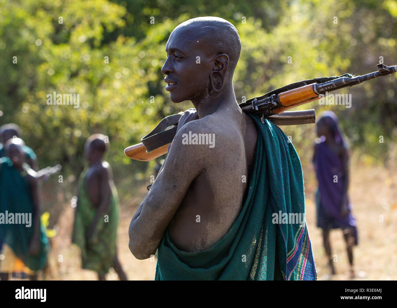 Suri tribe warriors during a donga stick fighting ritual, Omo valley, Kibish, Ethiopia Stock Photo