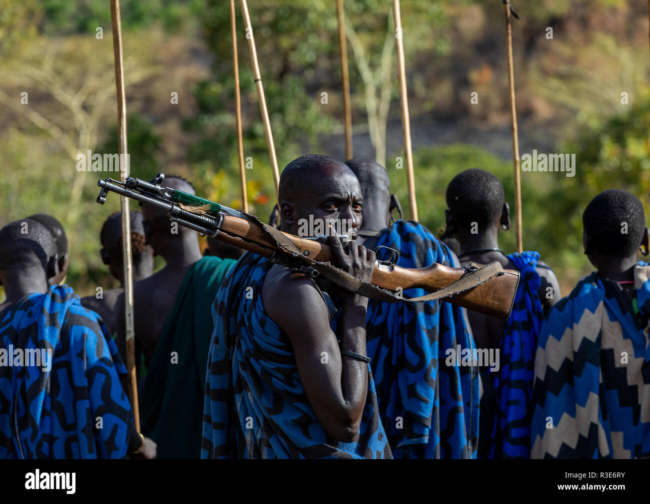 Suri tribe warriors during a donga stick fighting ritual, Omo valley, Kibish, Ethiopia Stock Photo