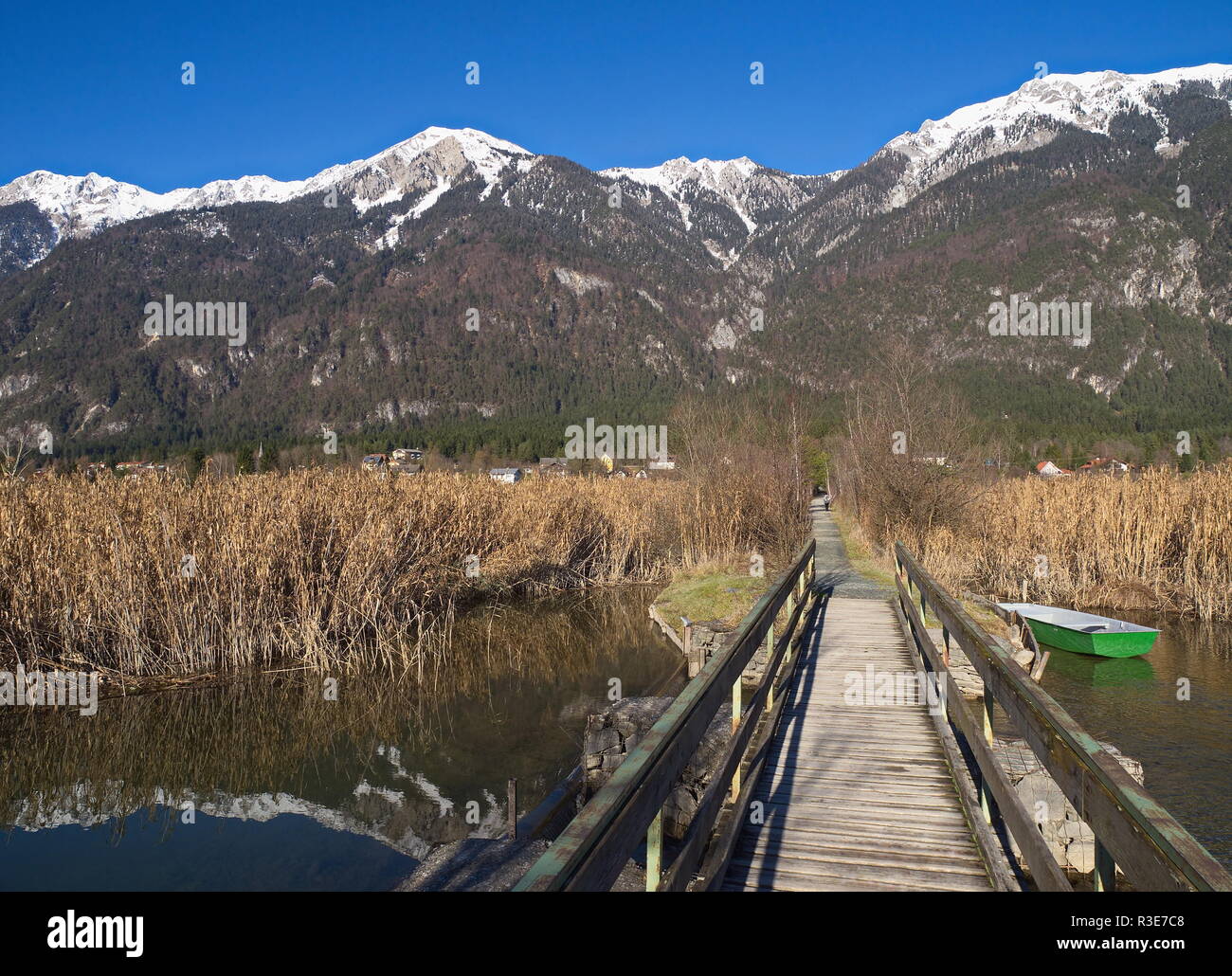 outflow of lake pressegg,in the background gailtaler alps / carinthia Stock Photo