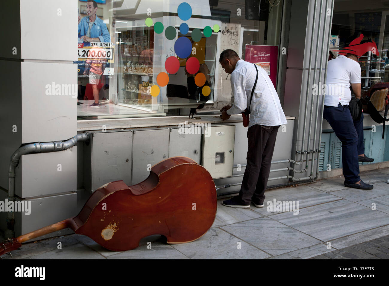 busker with double bass lisikratous plaka athens greece Stock Photo
