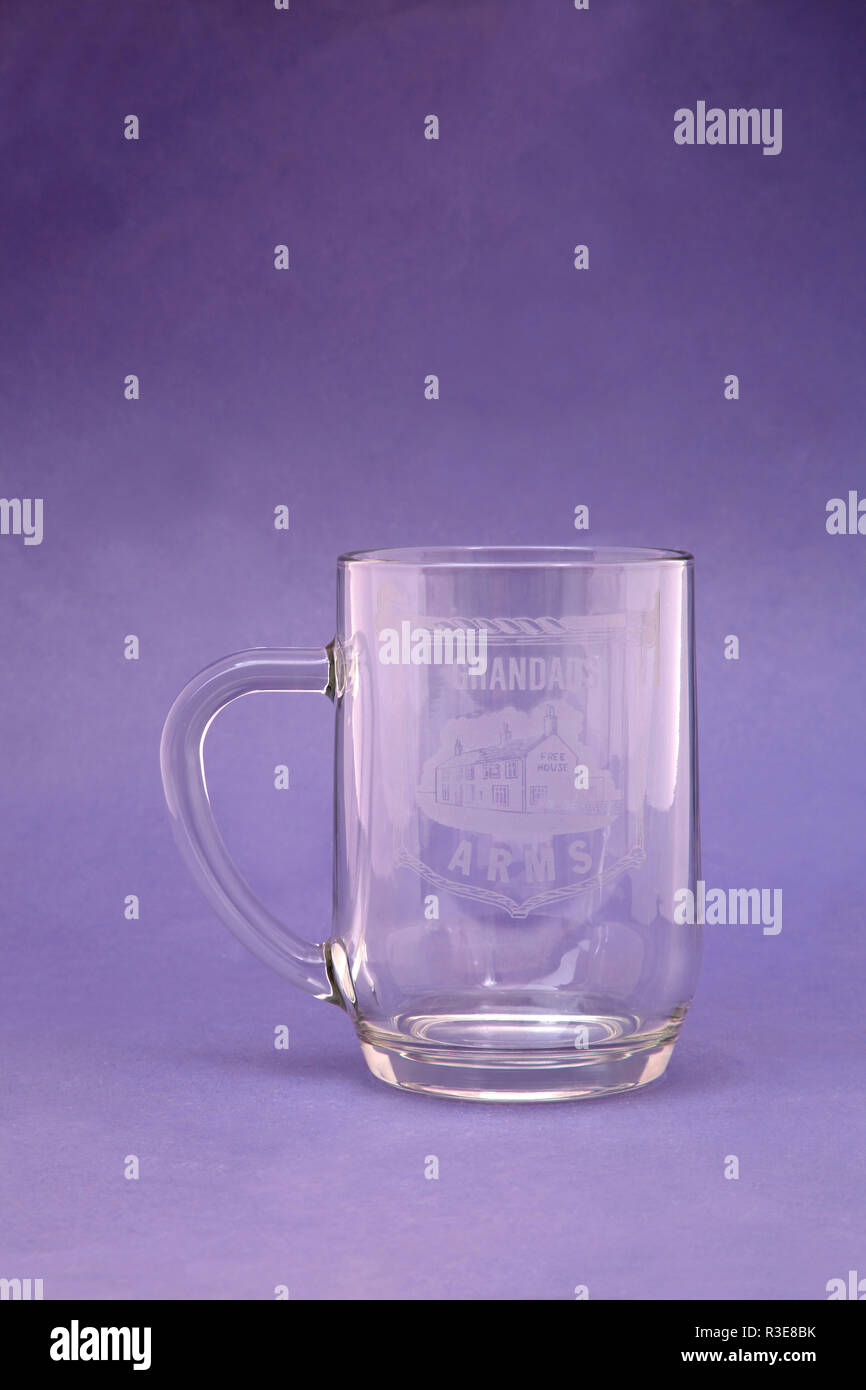 French Glass Pint Glass Tankard with Etched on Grandad's Arms Stock Photo