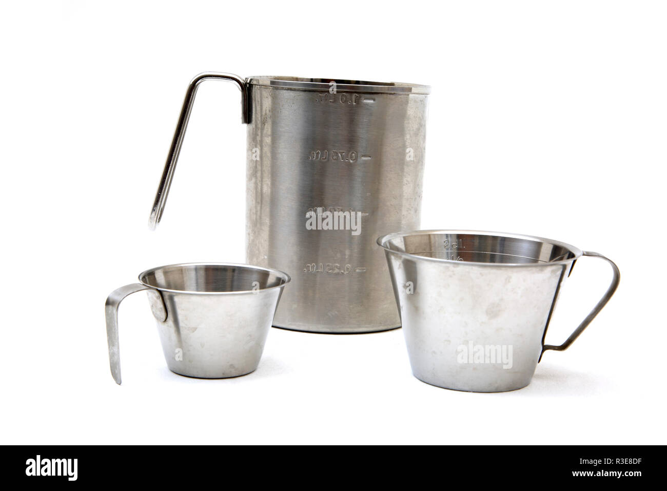 Stainless Steel Measuring Jug and Cups Stock Photo