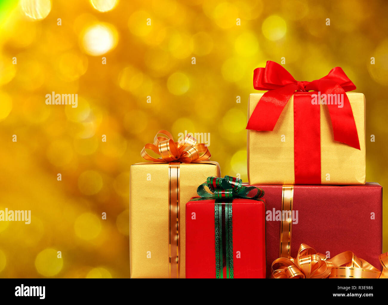Christmas gift box with lights on background Stock Photo