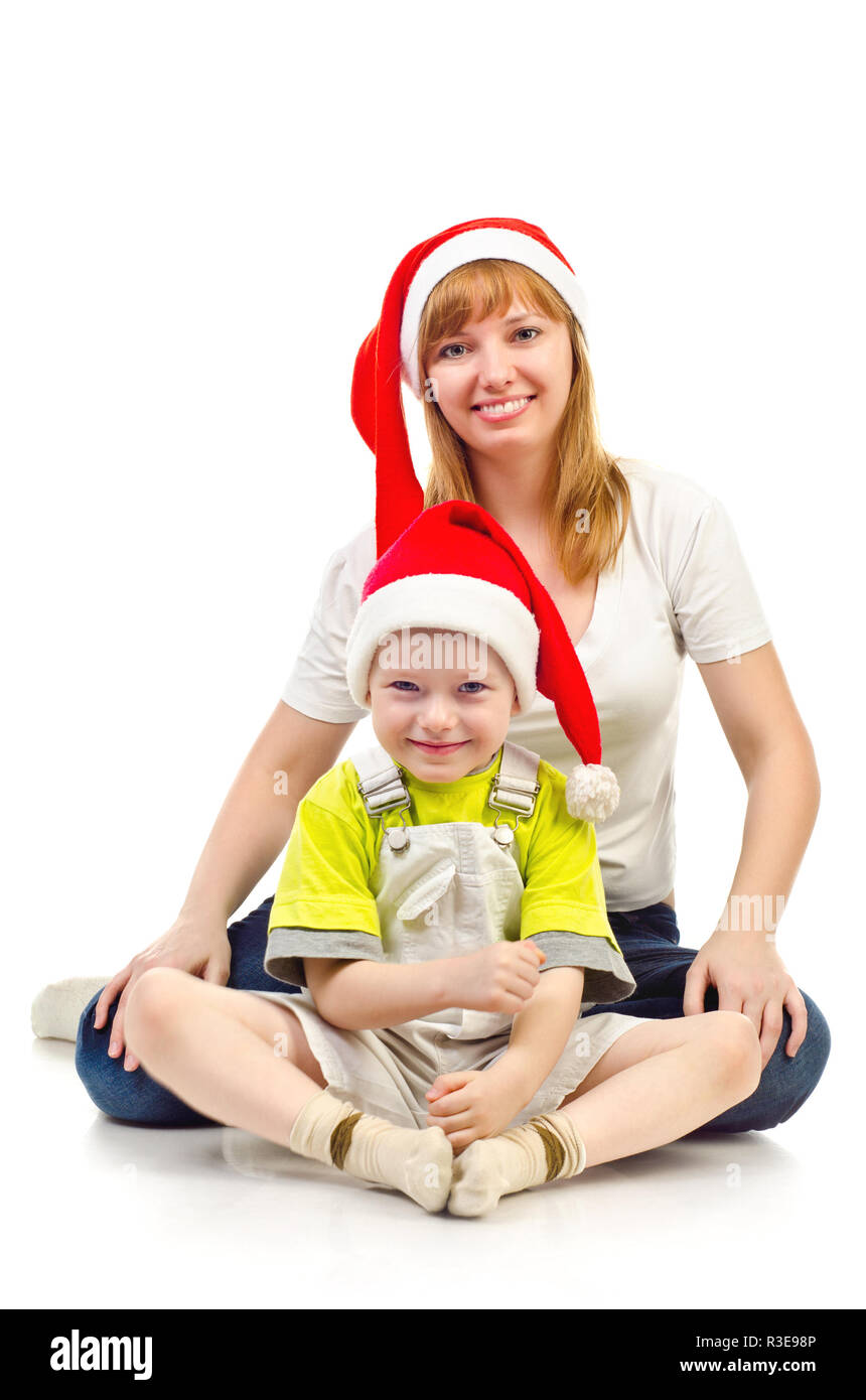 mother and child in christmas hats Stock Photo
