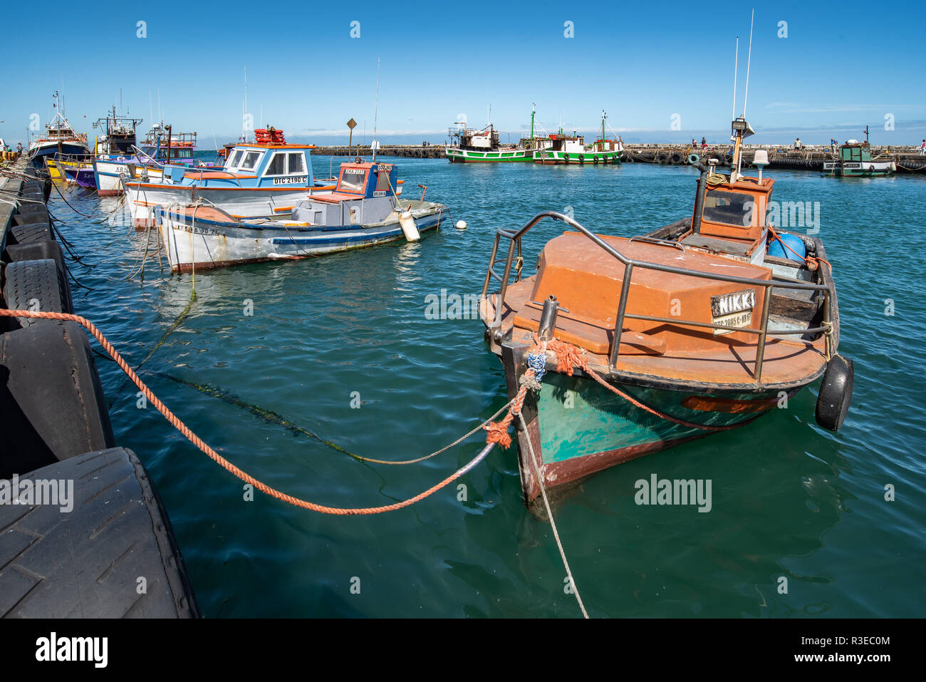 Colourful boats in the harbour of Kalk Bay, Cape Town, South Africa Stock Photo
